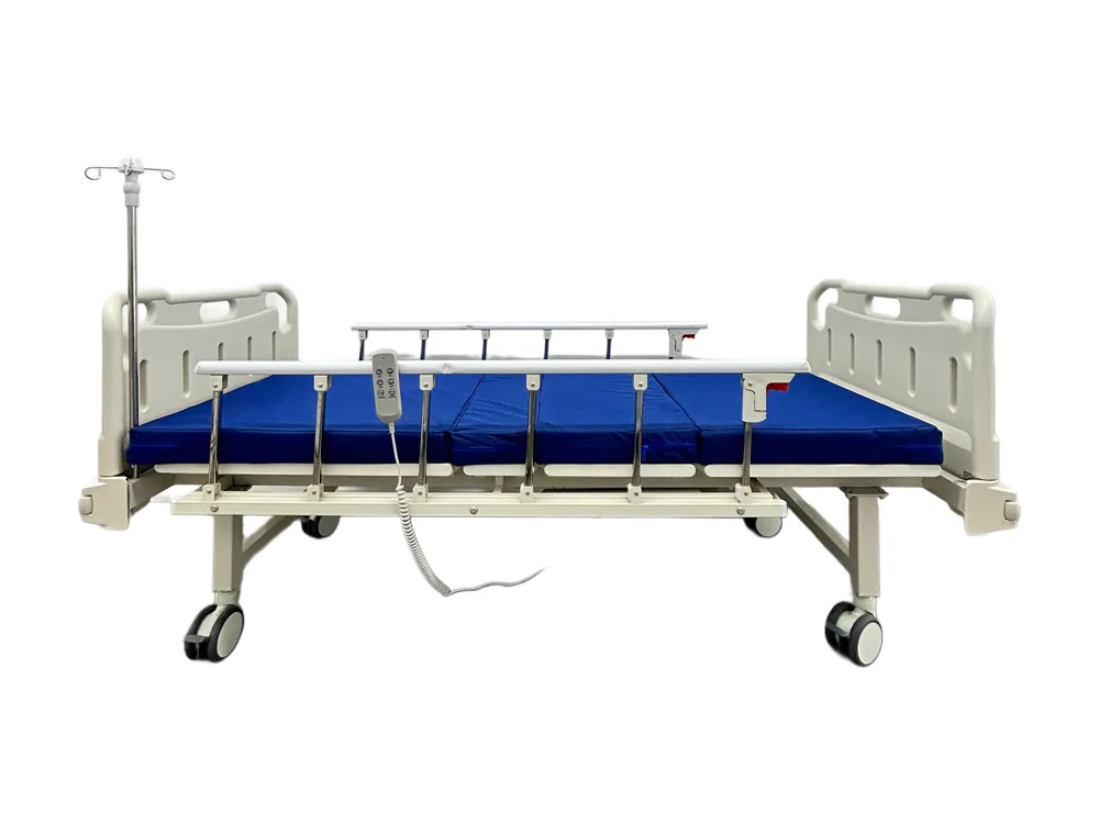Medlink No-Frill hospital bed with blue mattress, side rails and IV pole