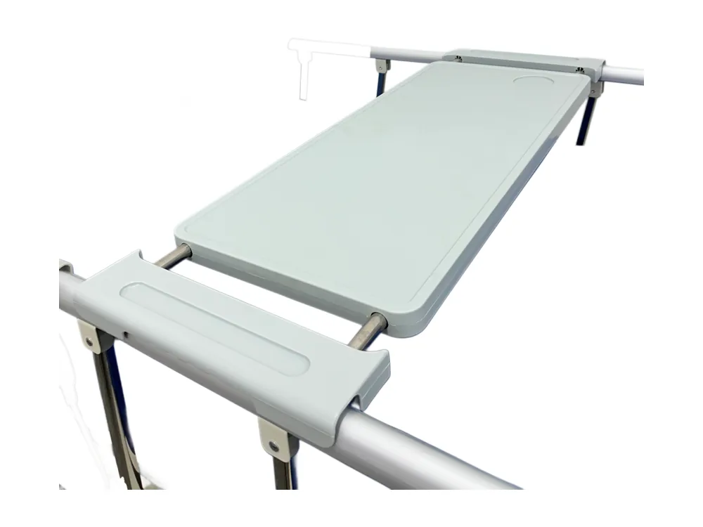 Medlink overbed table mounted on a hospital bed side rail